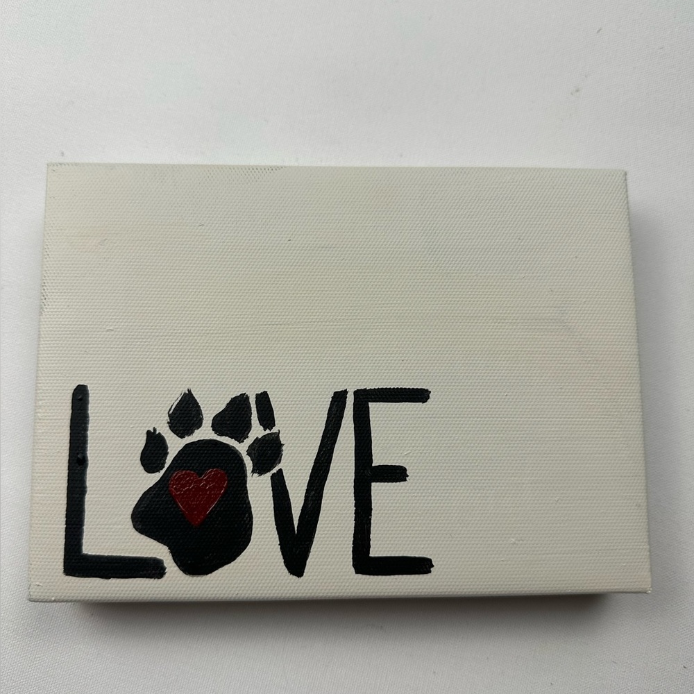 Hand crafted (painted) wall art decor. “Love” with a puppy paw and heart.